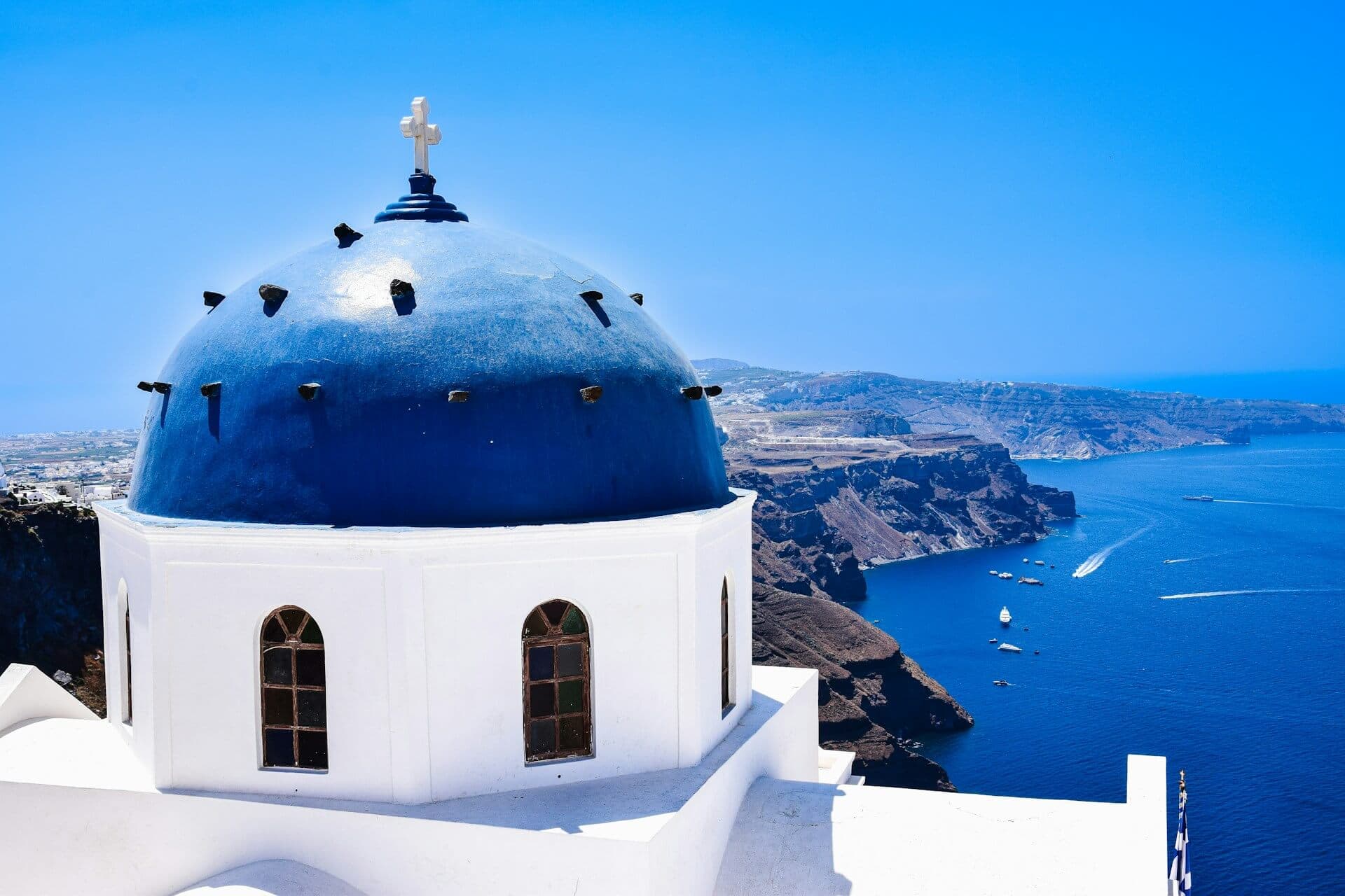 Mykonos or Santorini? How to Get There, What to Expect & Island Connections